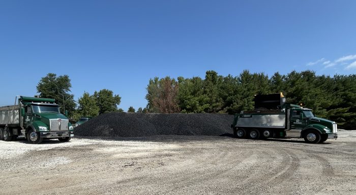 Loading up the stockpiled pug mix to truck to the laydown cold mix